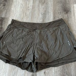 Green athletic shorts